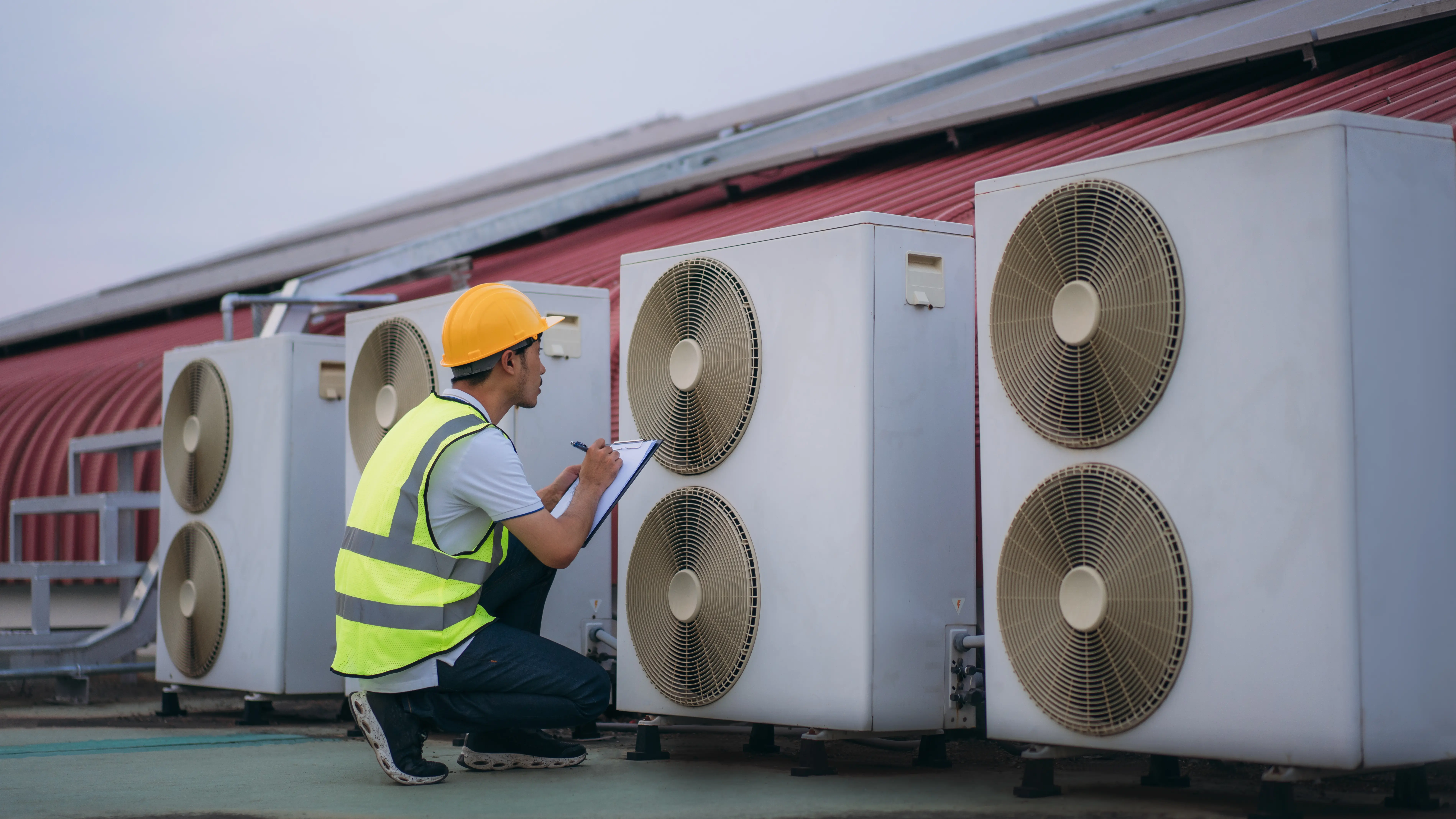 Engineers checking the air conditioning cooling system